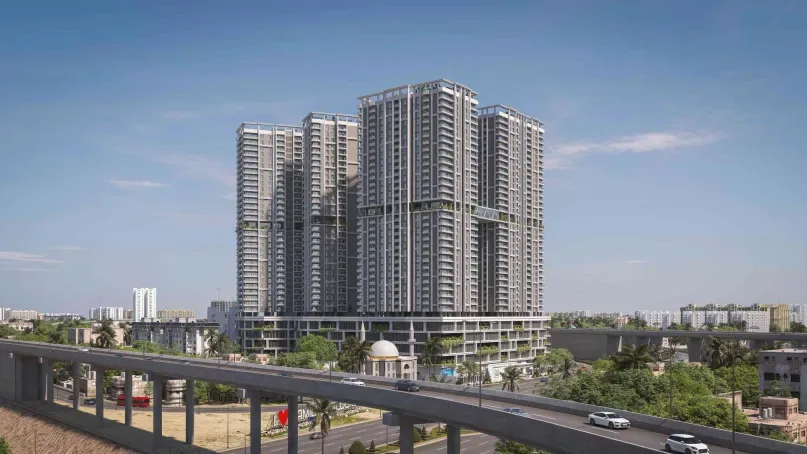 Daytime hero view of high-rise residential towers above a city flyover